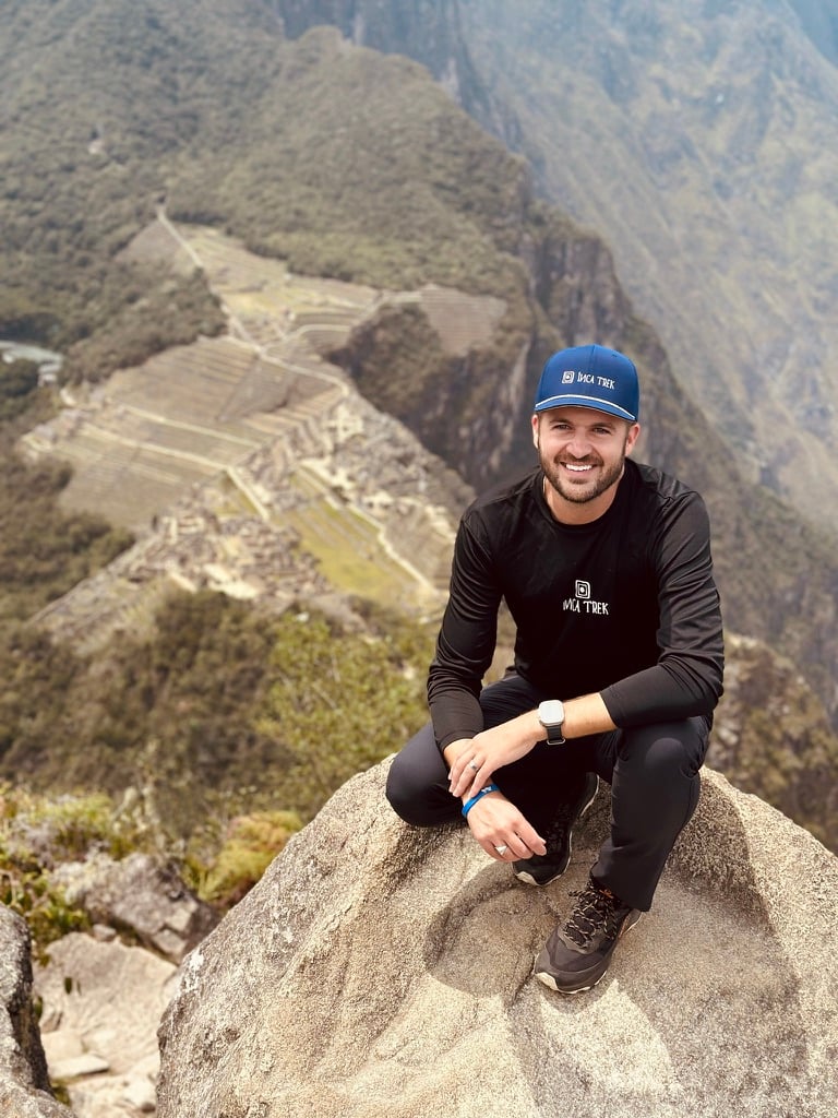 Jared Snow, founder of Destination Peru, above Machu Picchu